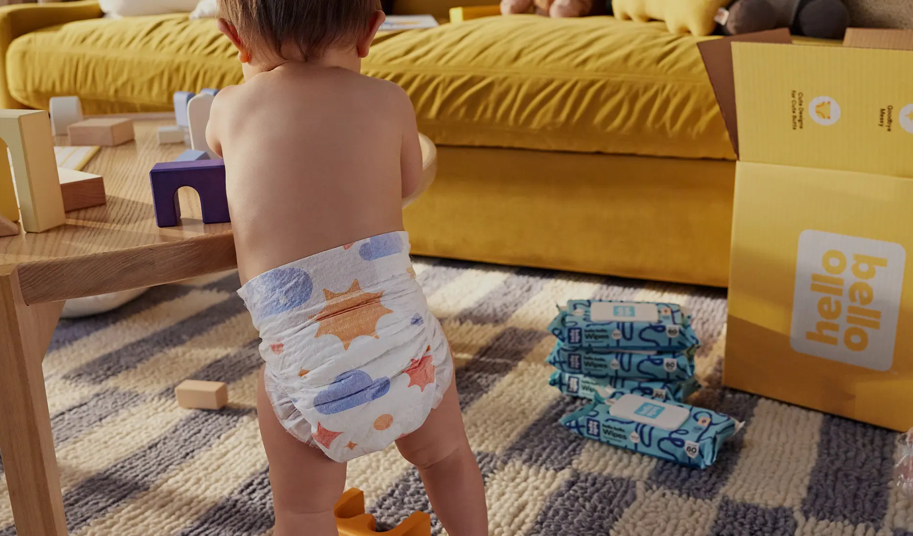 Baby standing in diaper 